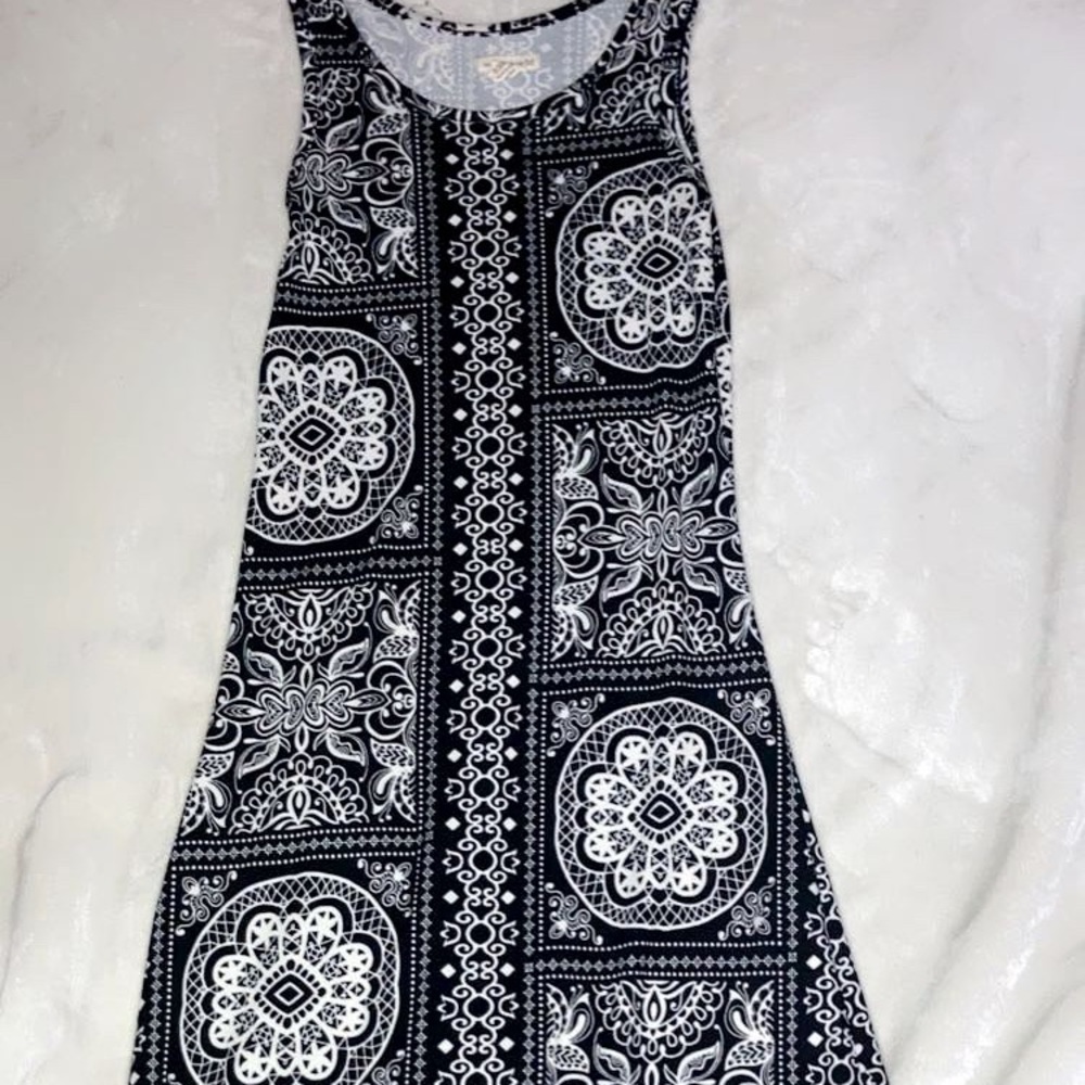 This is a dress that is tight around the waist and loose at the bottom